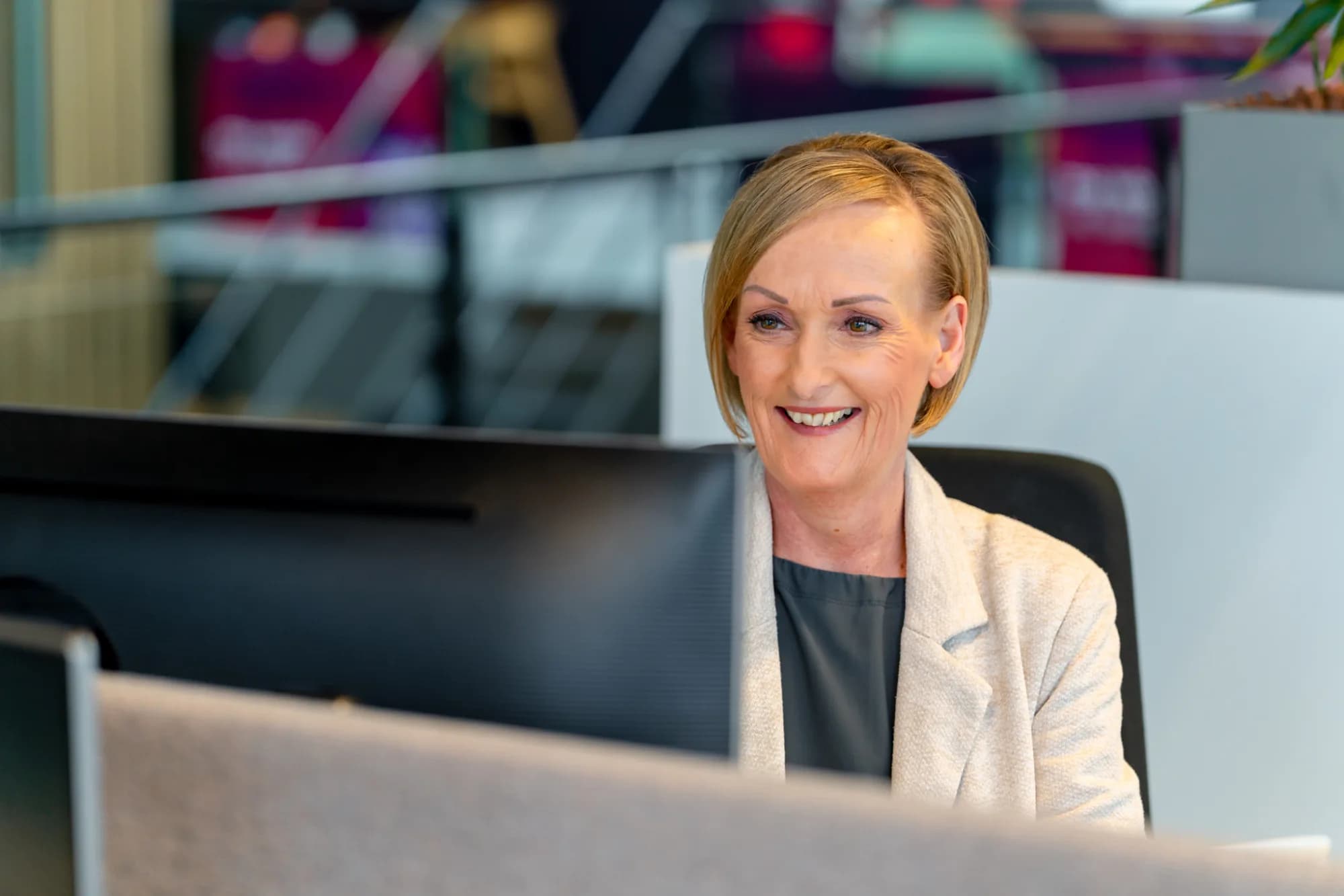 Person at work, analysing rates and market trends for external hiring.